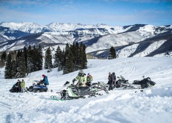 Snowmobiling in Whistler with The Journey Group